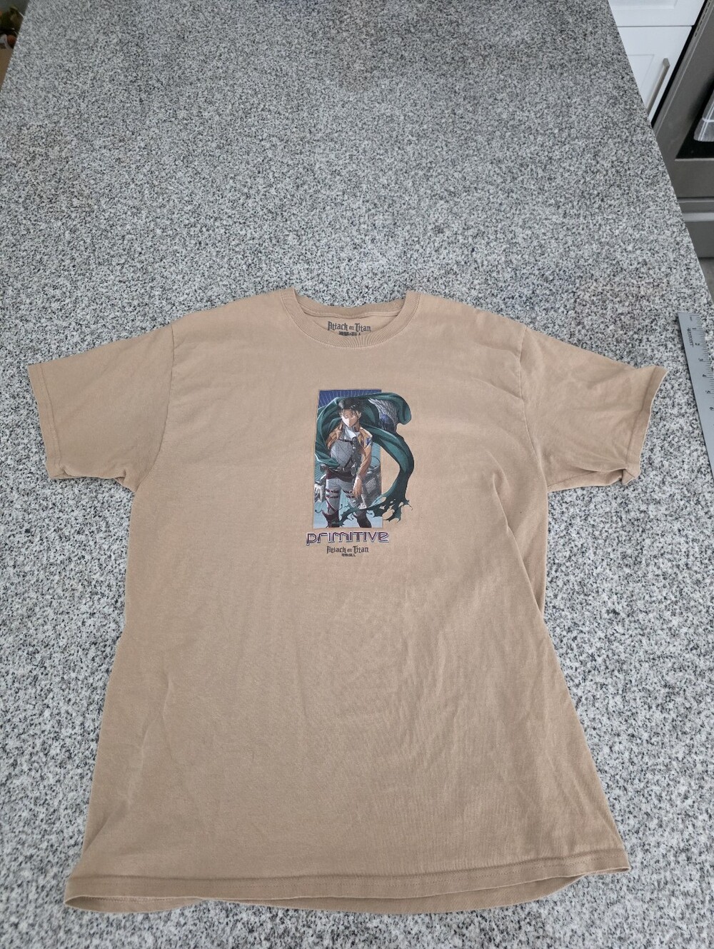 Pre Owned Attack On Titan X Primitive Captain Levi Tee In Tan. Mens Large